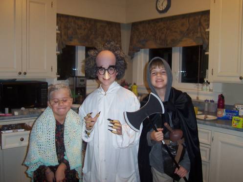 Mad scientist, henchman and suspicious-looking little-old-lady ready for the candy grab in the neighbourhood